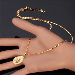 NWOT New 18K Gold Virgin Mary Necklace. In the gift bag. Brand New!
